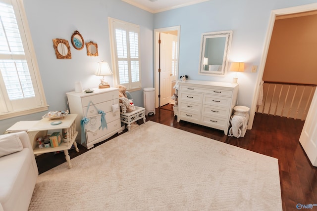 235 Inverness Dr Unit 235, Huntsville, AL 35802 - bedroom with crown molding and dark wood-style flooring