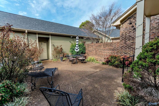 235 Inverness Dr Unit 235, Huntsville, AL 35802 - view of patio featuring outdoor dining area and fence