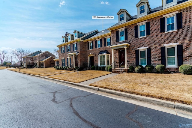 235 Inverness Dr Unit 235, Huntsville, AL 35802 - georgian-style home with a residential view and brick siding