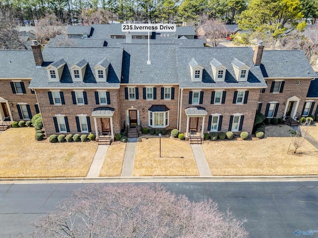 235 Inverness Dr Unit 235, Huntsville, AL 35802 - view of front of property with brick siding, a shingled roof, and a residential view