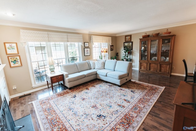 235 Inverness Dr Unit 235, Huntsville, AL 35802 - living room featuring ornamental molding, dark wood finished floors, visible vents, and baseboards