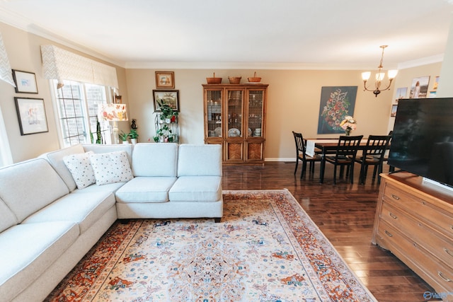 235 Inverness Dr Unit 235, Huntsville, AL 35802 - living area with ornamental molding, dark wood-style flooring, a notable chandelier, and baseboards