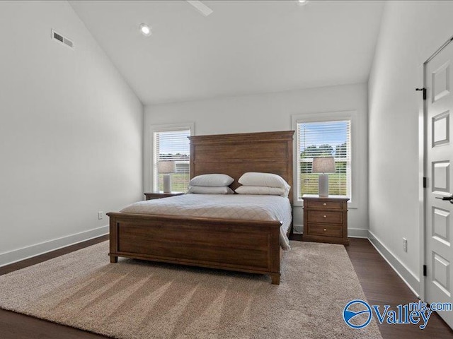 23819 Justin Brent Cir, Elkmont, AL 35620 - bedroom featuring baseboards, high vaulted ceiling, and dark wood finished floors