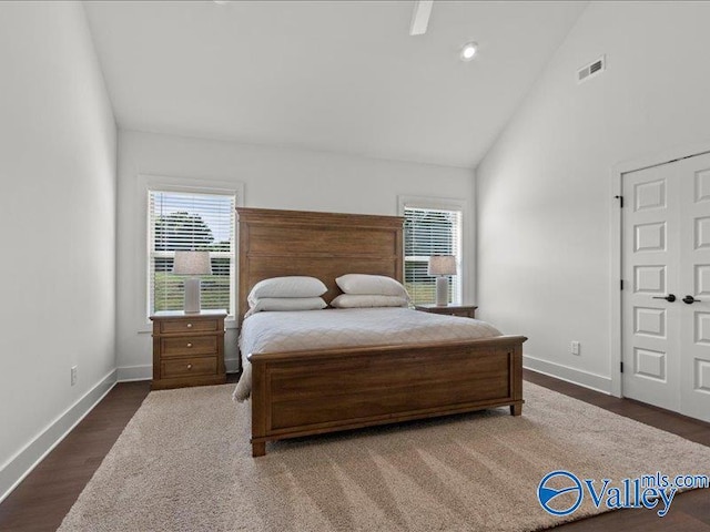 23819 Justin Brent Cir, Elkmont, AL 35620 - bedroom with baseboards, high vaulted ceiling, and wood finished floors