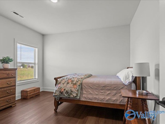 23819 Justin Brent Cir, Elkmont, AL 35620 - bedroom featuring wood finished floors and baseboards