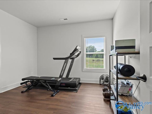 23819 Justin Brent Cir, Elkmont, AL 35620 - workout area with wood finished floors and baseboards