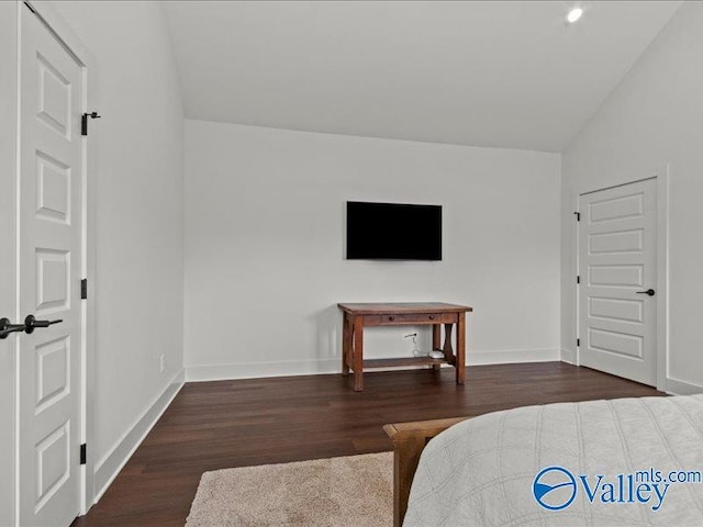 23819 Justin Brent Cir, Elkmont, AL 35620 - bedroom featuring wood finished floors, vaulted ceiling, baseboards, and recessed lighting