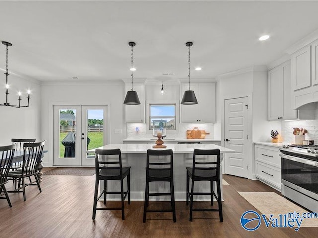 23819 Justin Brent Cir, Elkmont, AL 35620 - kitchen featuring stainless steel stove, light countertops, healthy amount of natural light, a kitchen island, and recessed lighting