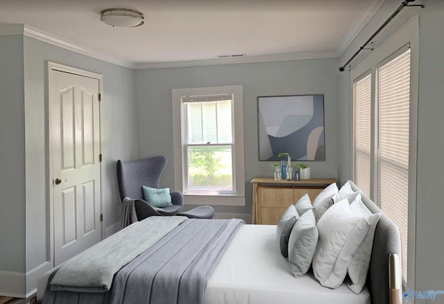 505 Mccullough Ave NE, Huntsville, AL 35801 - bedroom with crown molding and visible vents