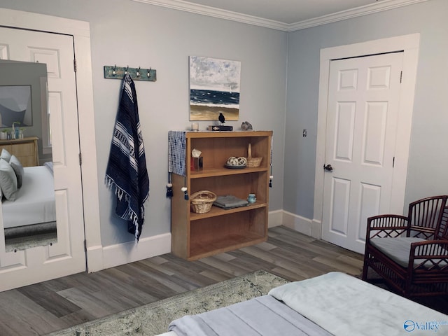 505 Mccullough Ave NE, Huntsville, AL 35801 - bedroom with baseboards, crown molding, and wood finished floors