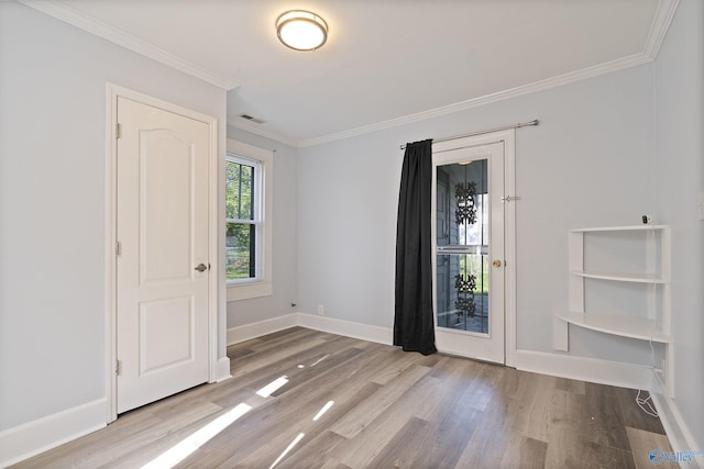505 Mccullough Ave NE, Huntsville, AL 35801 - unfurnished room with wood finished floors, visible vents, baseboards, and ornamental molding