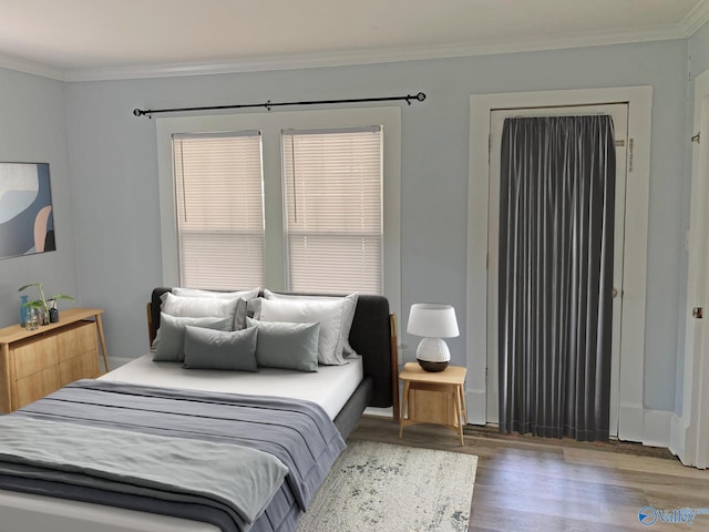 505 Mccullough Ave NE, Huntsville, AL 35801 - bedroom with wood finished floors and crown molding