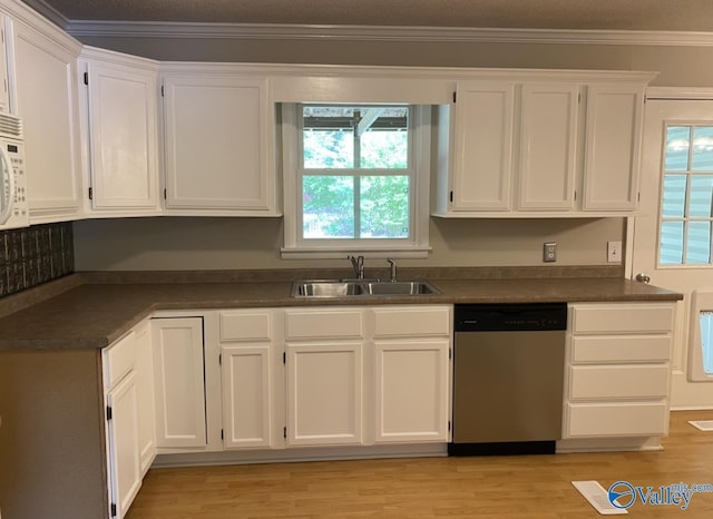 230 Hampton Rd, Hartselle, AL 35640 - kitchen with dishwasher, a sink, white cabinetry, dark countertops, and ornamental molding