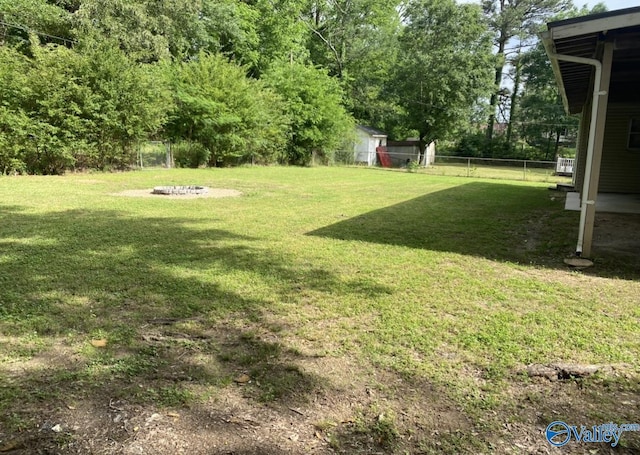 230 Hampton Rd, Hartselle, AL 35640 - view of yard with an outdoor fire pit