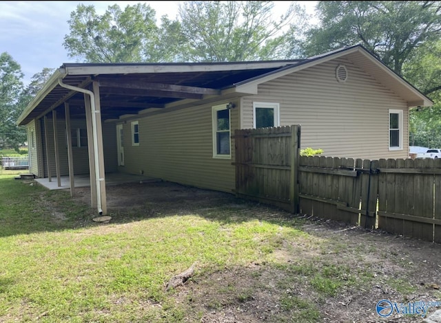 230 Hampton Rd, Hartselle, AL 35640 - view of side of property with an attached carport