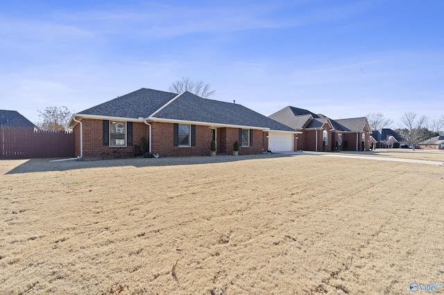 single story home with a garage