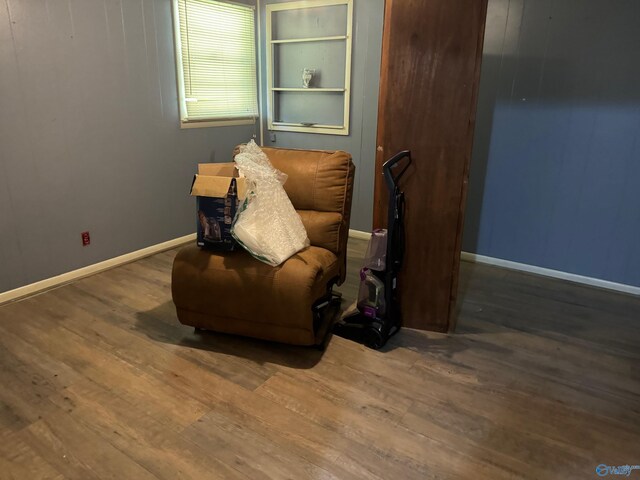 sitting room with hardwood / wood-style floors