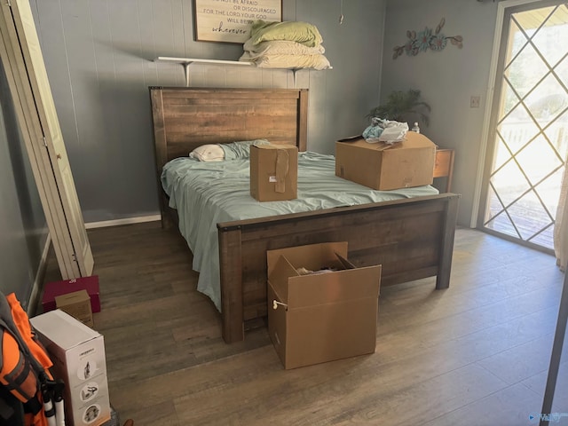 bedroom with wood finished floors