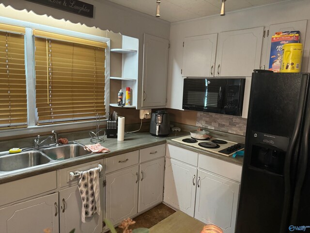 kitchen with black appliances, open shelves, a sink, and white cabinetry