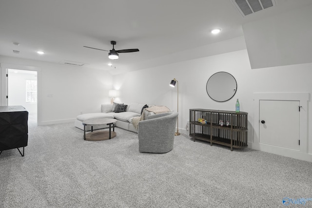 living room featuring ceiling fan and carpet floors