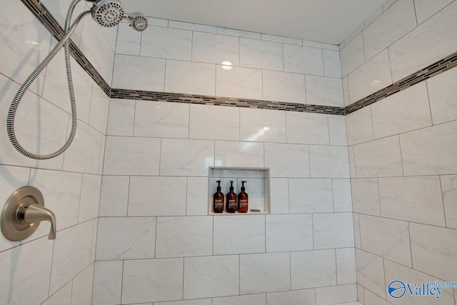 interior space featuring tiled shower