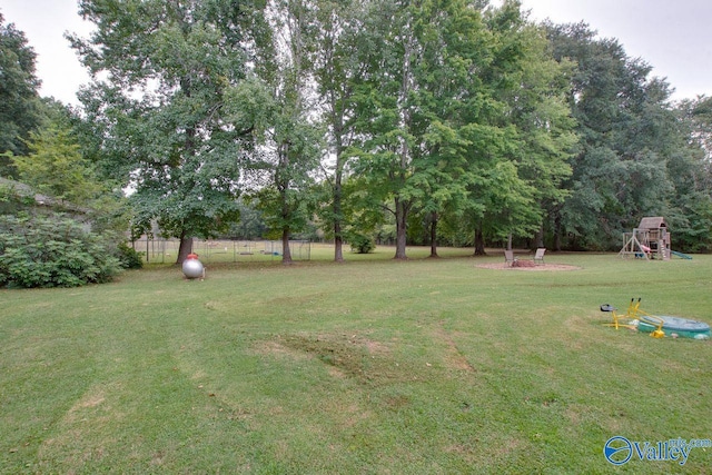 view of yard featuring a playground