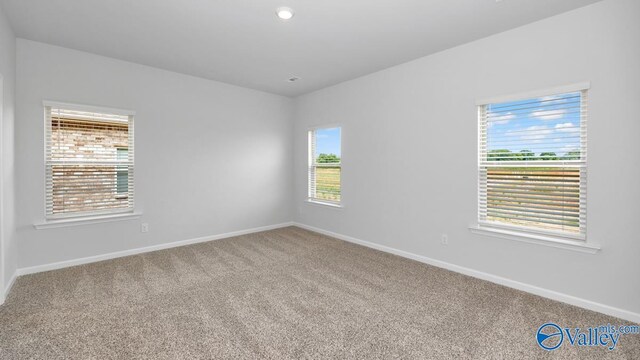 empty room with carpet floors