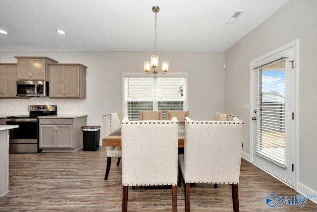 114 Burdine St, New Market, AL 35761 - dining space with a chandelier, dark wood-style flooring, recessed lighting, and baseboards