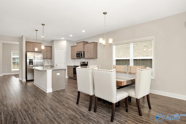 114 Burdine St, New Market, AL 35761 - dining space with dark wood-type flooring, a chandelier, baseboards, and recessed lighting