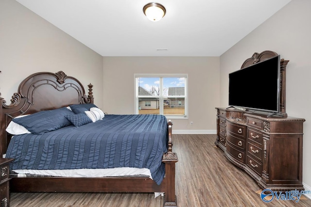 114 Burdine St, New Market, AL 35761 - bedroom featuring baseboards and wood finished floors