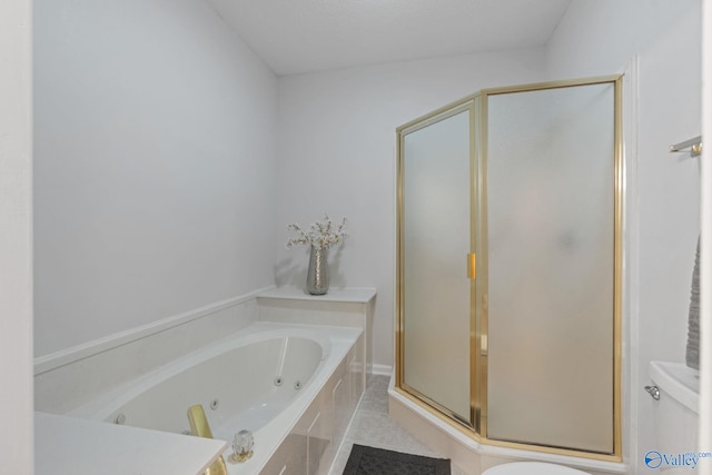 bathroom featuring tile patterned flooring and independent shower and bath