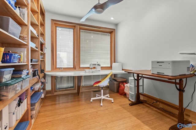 office space with light hardwood / wood-style floors