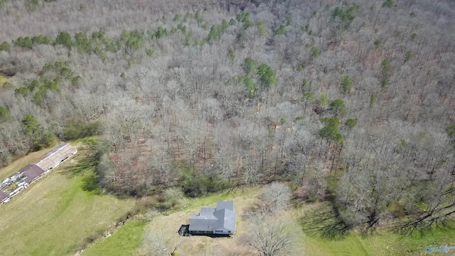 drone / aerial view with a forest view