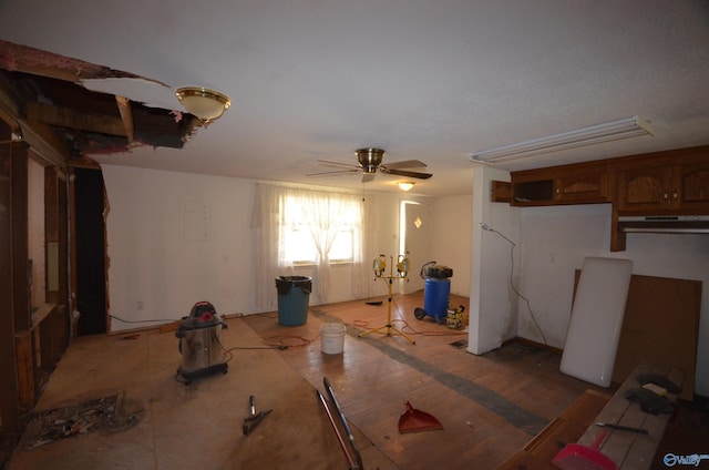interior space featuring ceiling fan
