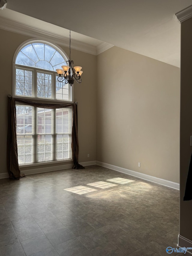 empty room with a chandelier, baseboards, and ornamental molding