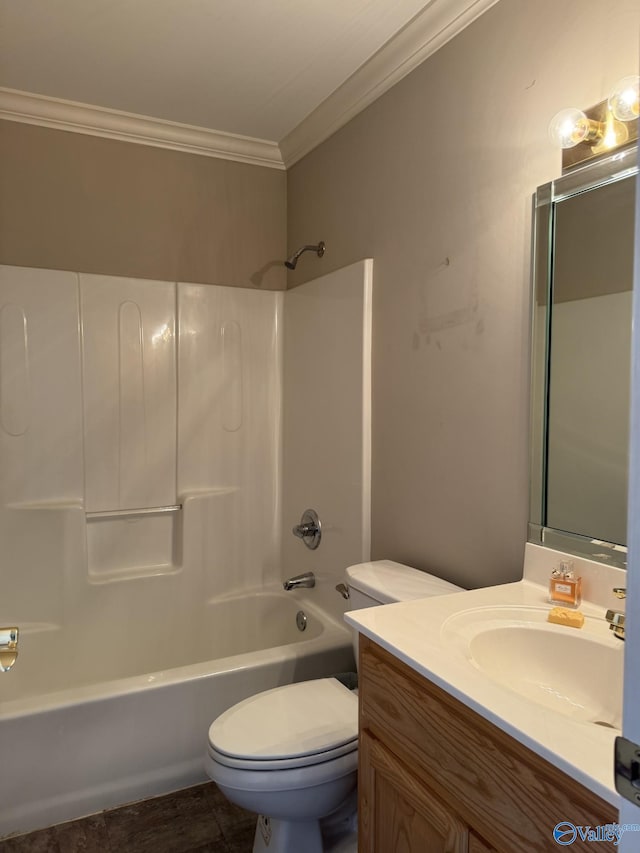 bathroom with vanity, toilet, ornamental molding, and shower / bathtub combination