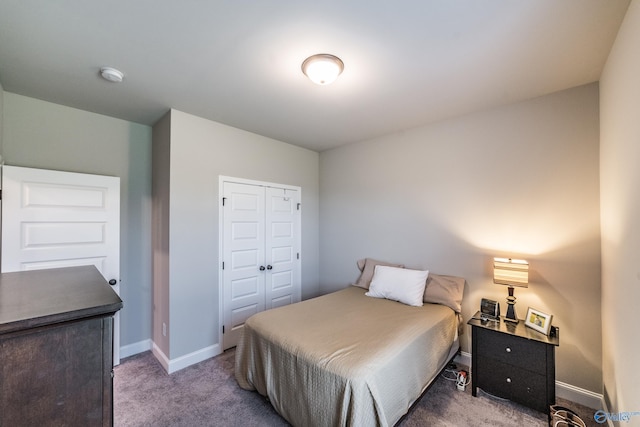 carpeted bedroom with a closet