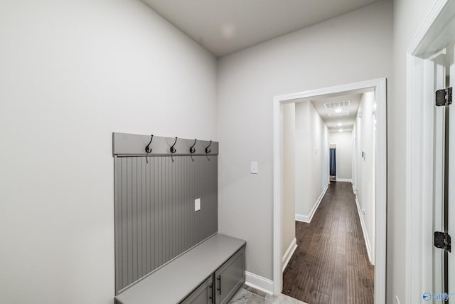 mudroom with hardwood / wood-style flooring