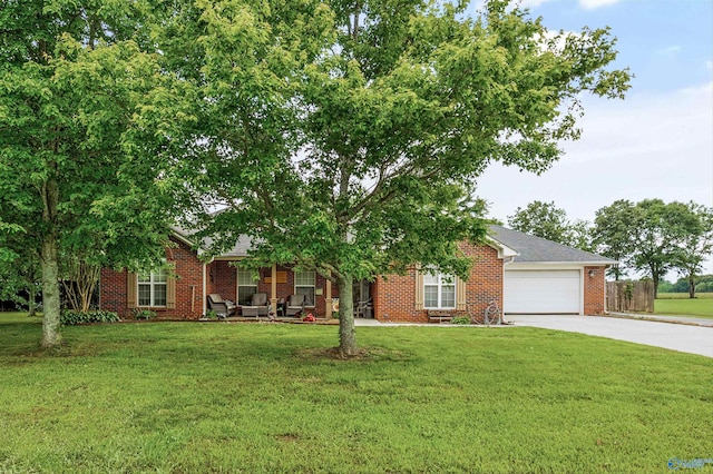 20729 Colonial Dr, Athens, AL 35614 - view of front of property featuring driveway, a front yard, and a garage