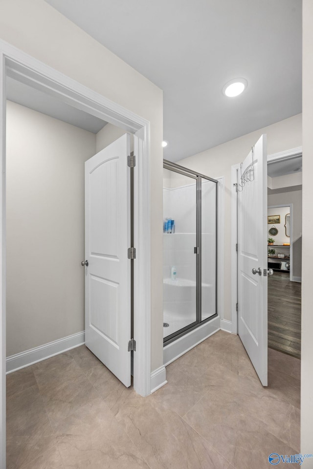 bathroom featuring walk in shower