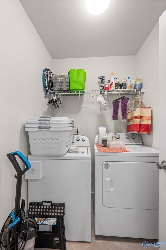 laundry room with independent washer and dryer