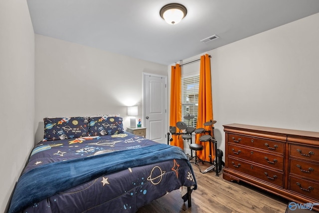 bedroom featuring light hardwood / wood-style floors