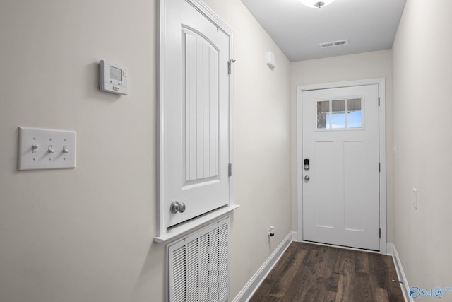 doorway to outside featuring dark hardwood / wood-style floors