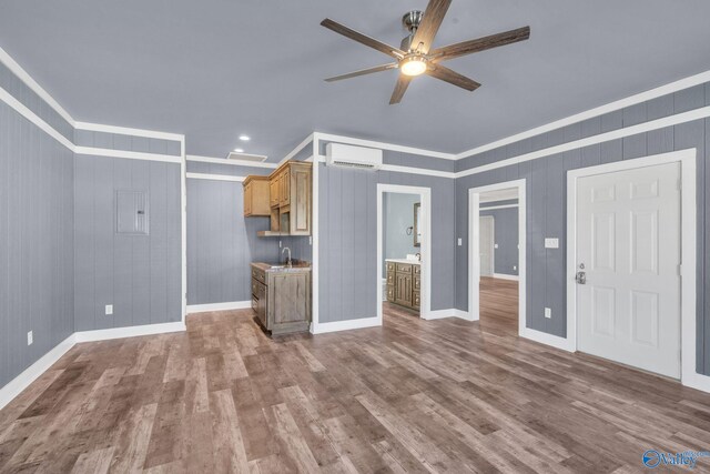 kitchen with white cabinets, appliances with stainless steel finishes, plenty of natural light, and ceiling fan