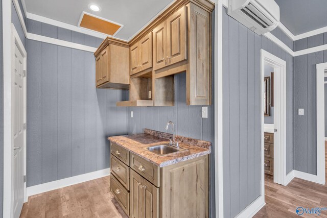 kitchen featuring decorative light fixtures, a kitchen bar, a center island, ceiling fan, and white cabinets