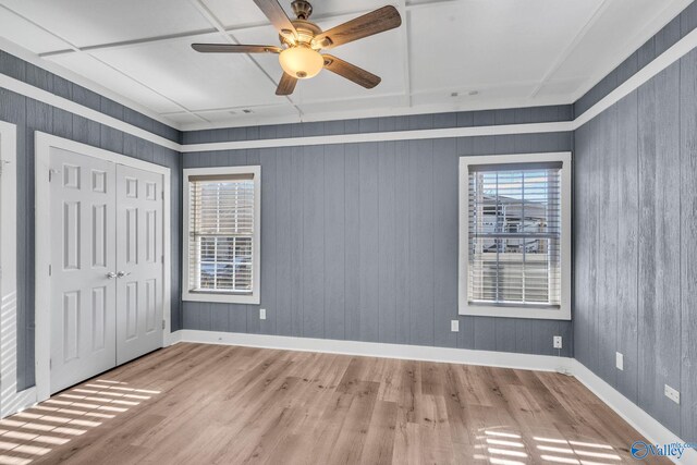 kitchen featuring white cabinetry and wood-type flooring