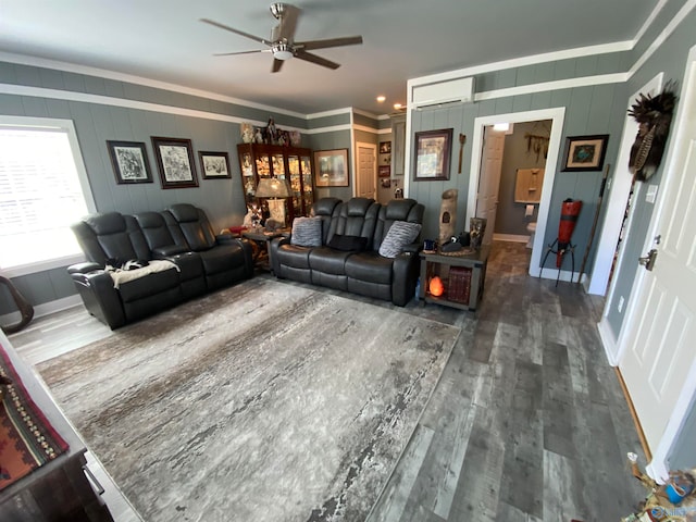 living room featuring crown molding, a wall mounted AC, ceiling fan, and dark hardwood / wood-style floors