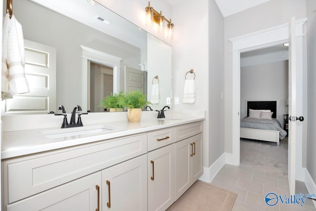 217 Idle Creek Dr, Huntsville, AL 35811 - ensuite bathroom with double vanity, a sink, visible vents, and connected bathroom