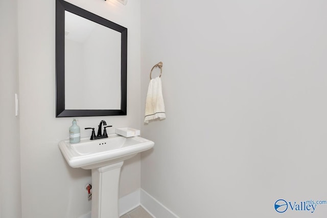 217 Idle Creek Dr, Huntsville, AL 35811 - bathroom with a sink and baseboards