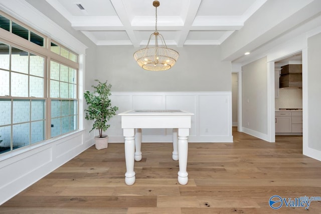 217 Idle Creek Dr, Huntsville, AL 35811 - unfurnished dining area featuring visible vents, a notable chandelier, a decorative wall, beamed ceiling, and coffered ceiling